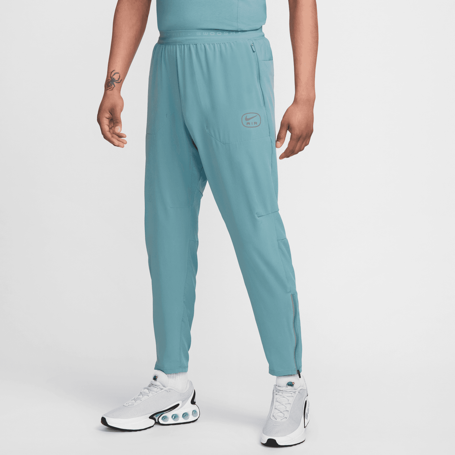 Survetement nike bleu turquoise sale