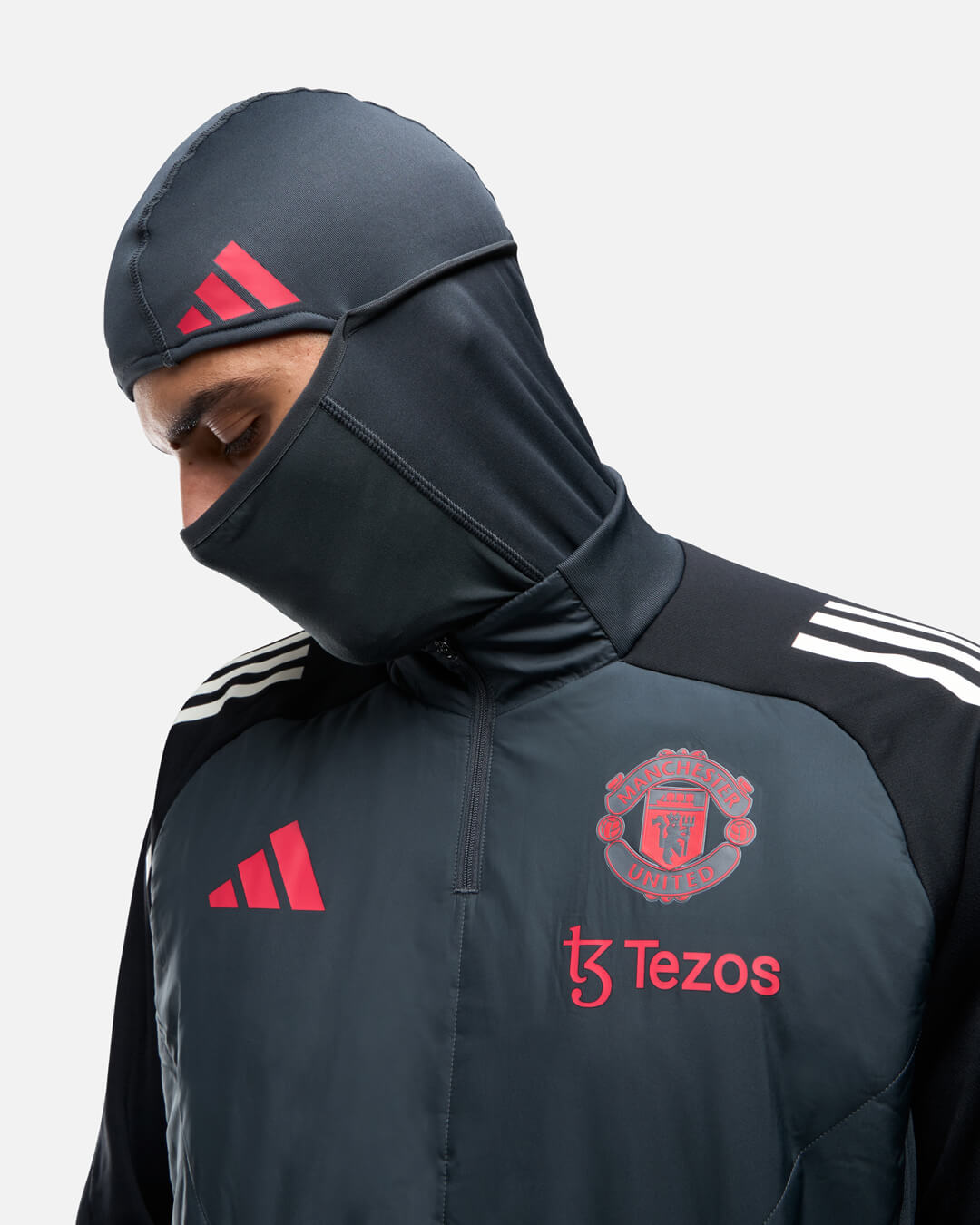 Camiseta Manchester United con cremallera 1/4 y pasamontañas integrado 2024/2025 - Negro/Rojo
