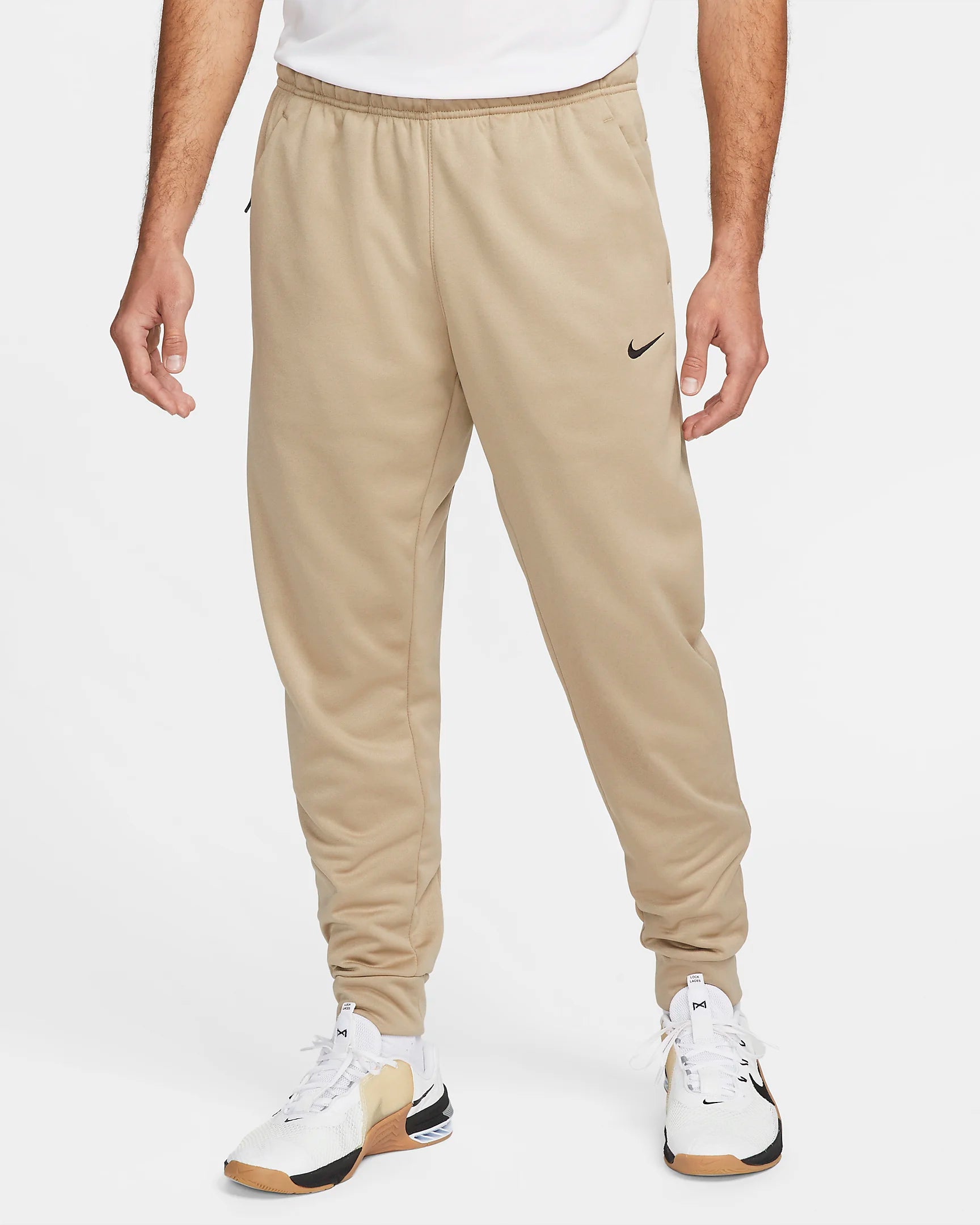 Nike beige pants best sale