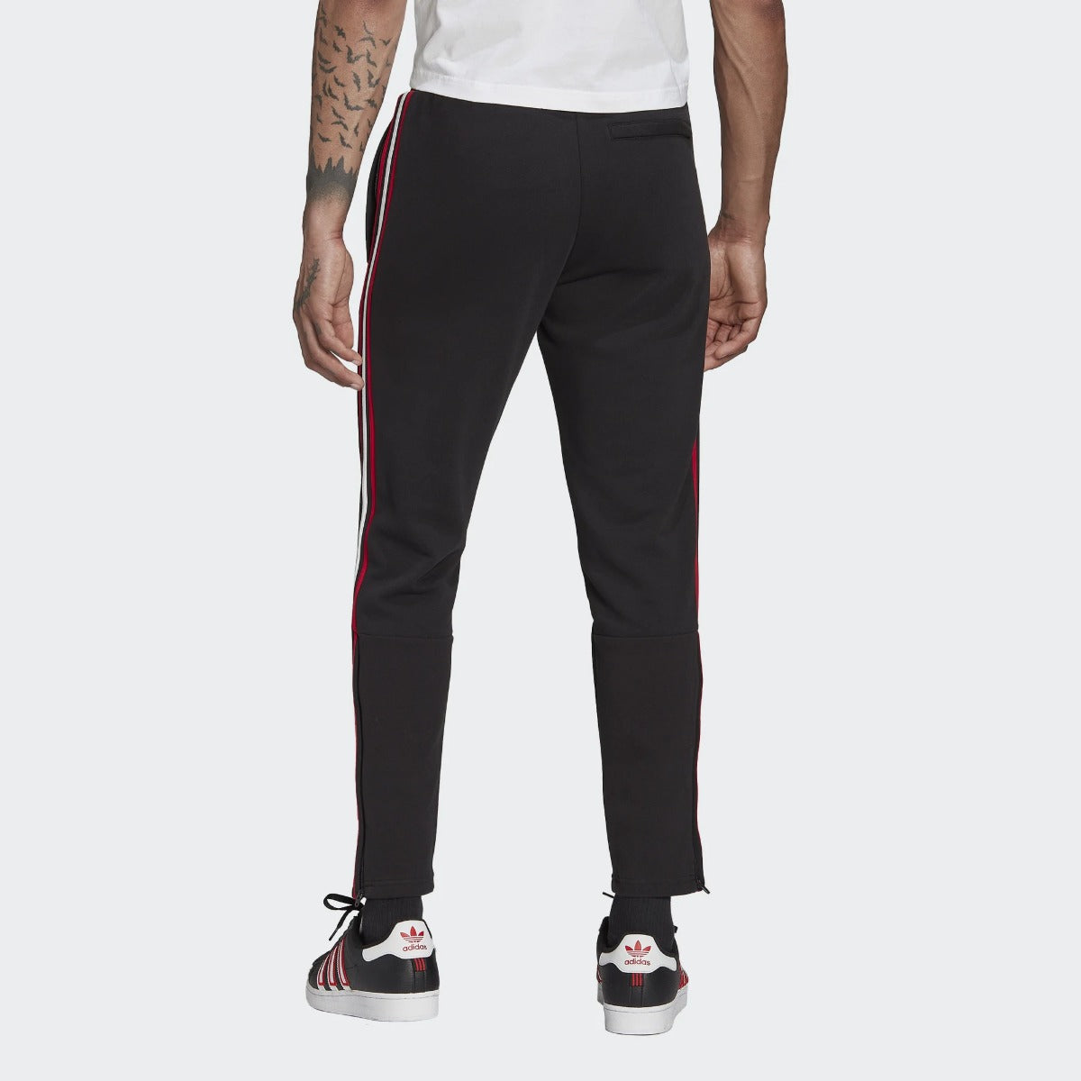 Pantalon d'entrainement Manchester United 2022/2023 - Noir/Rouge/Blanc