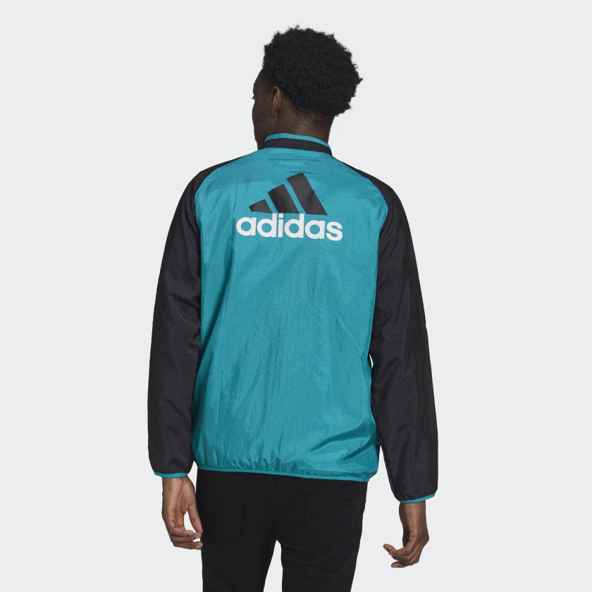 Chaqueta Real Madrid Icon Woven 2021/2022 - Negro/Azul