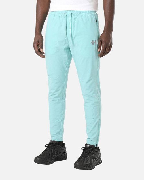 Pantalón Helvetica Bolt Woven - Verde - Footkorner