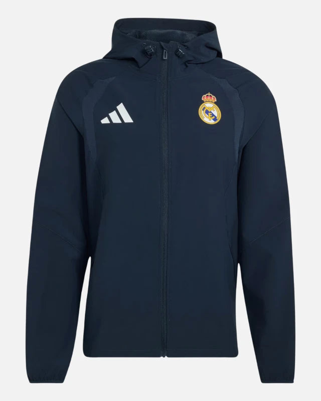 FootkornerVeste Real Madrid Tiro Travel 2026/2027- Bleu