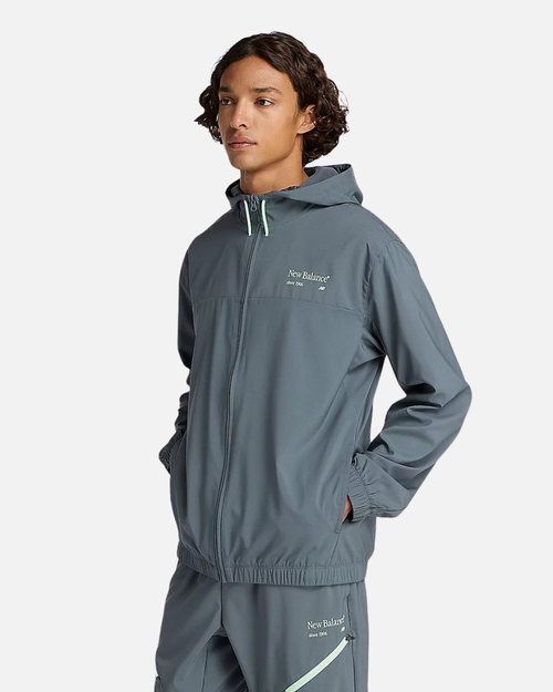 Chaqueta con capucha New Balance Reimagined Woven - Gris - Footkorner