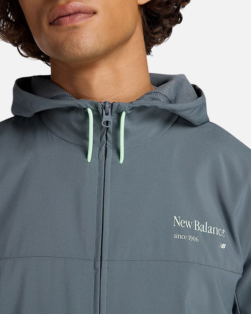 Chaqueta con capucha New Balance Reimagined Woven - Gris - Footkorner