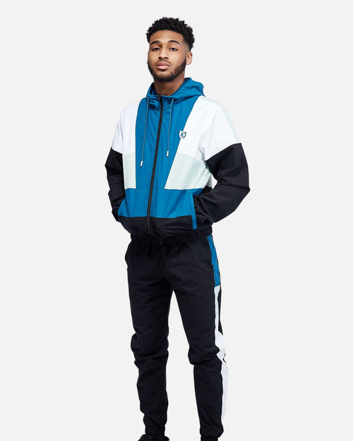 FTKR V Trainingsanzug – Schwarz/Blau/Weiß - Footkorner