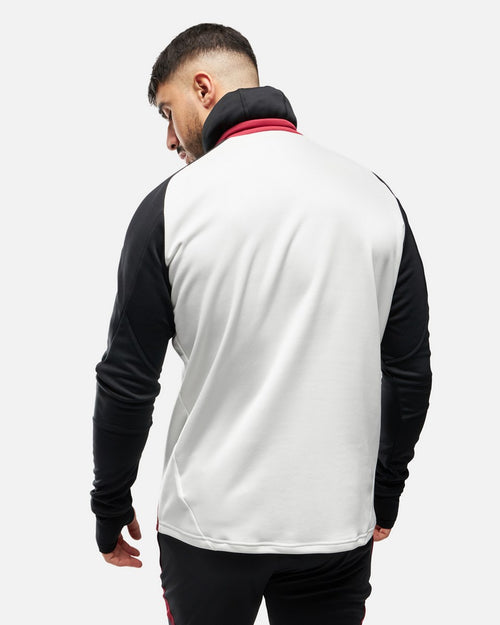 Manchester United 2024/2025 Oberteil mit integrierter Sturmhaube – Weiß/Schwarz/Rot - Footkorner