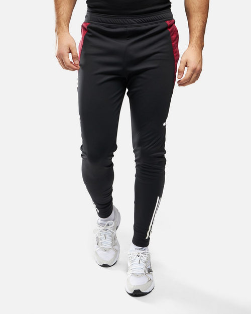 Pantalon d'entrainement Manchester United 2024/2025 - Noir/Rouge - Footkorner