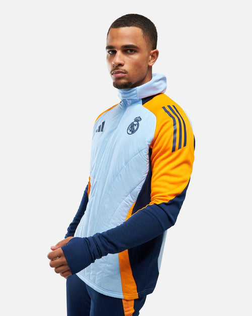 Veste Real Madrid cagoule intégrée 2025 - Bleu/Orange - Footkorner