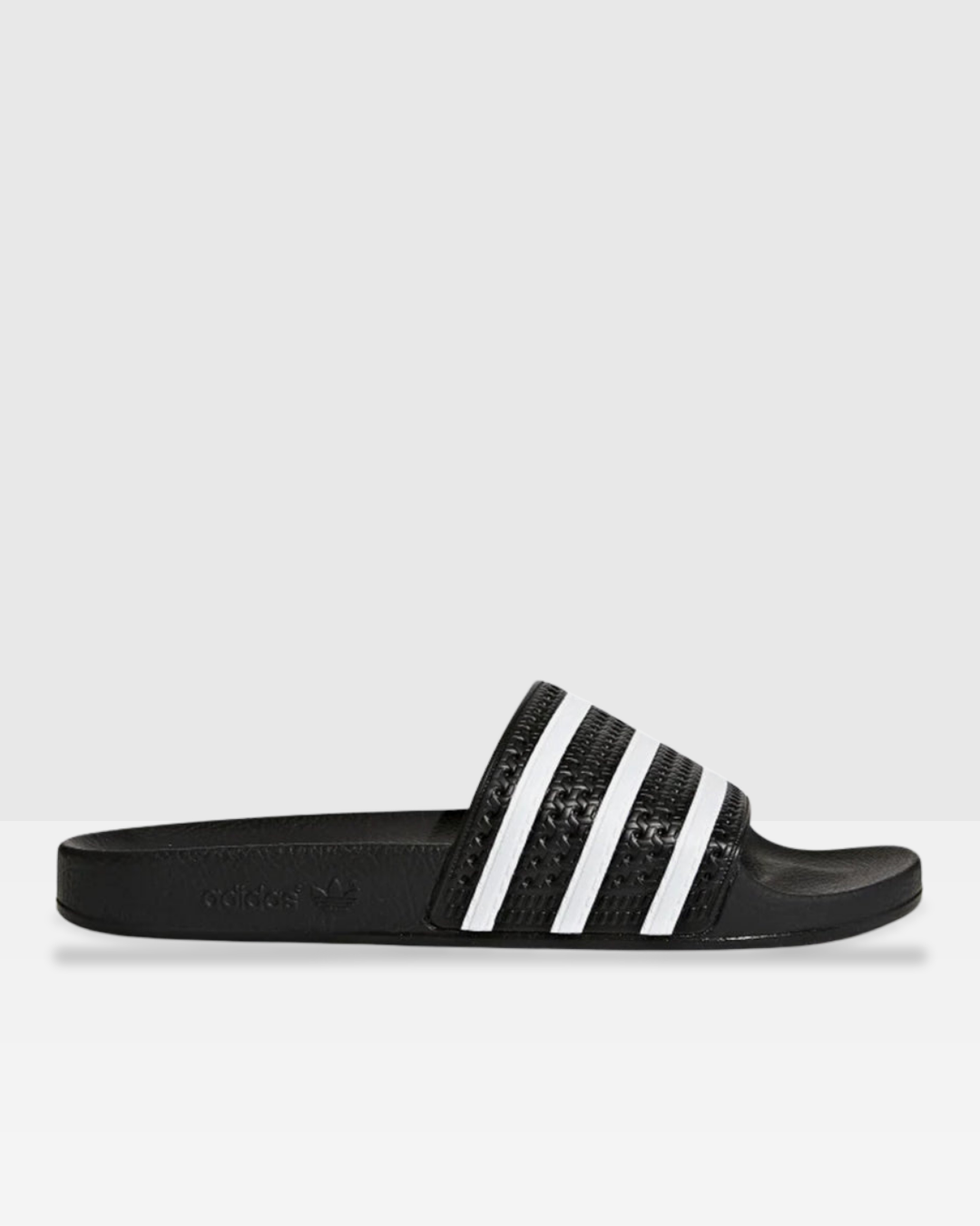 FootkornerClaquettes Adidas Adilette - Noir/Blanc