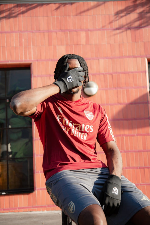 Arsenal training shirt 2023/2024 - Red/Gold - Footkorner