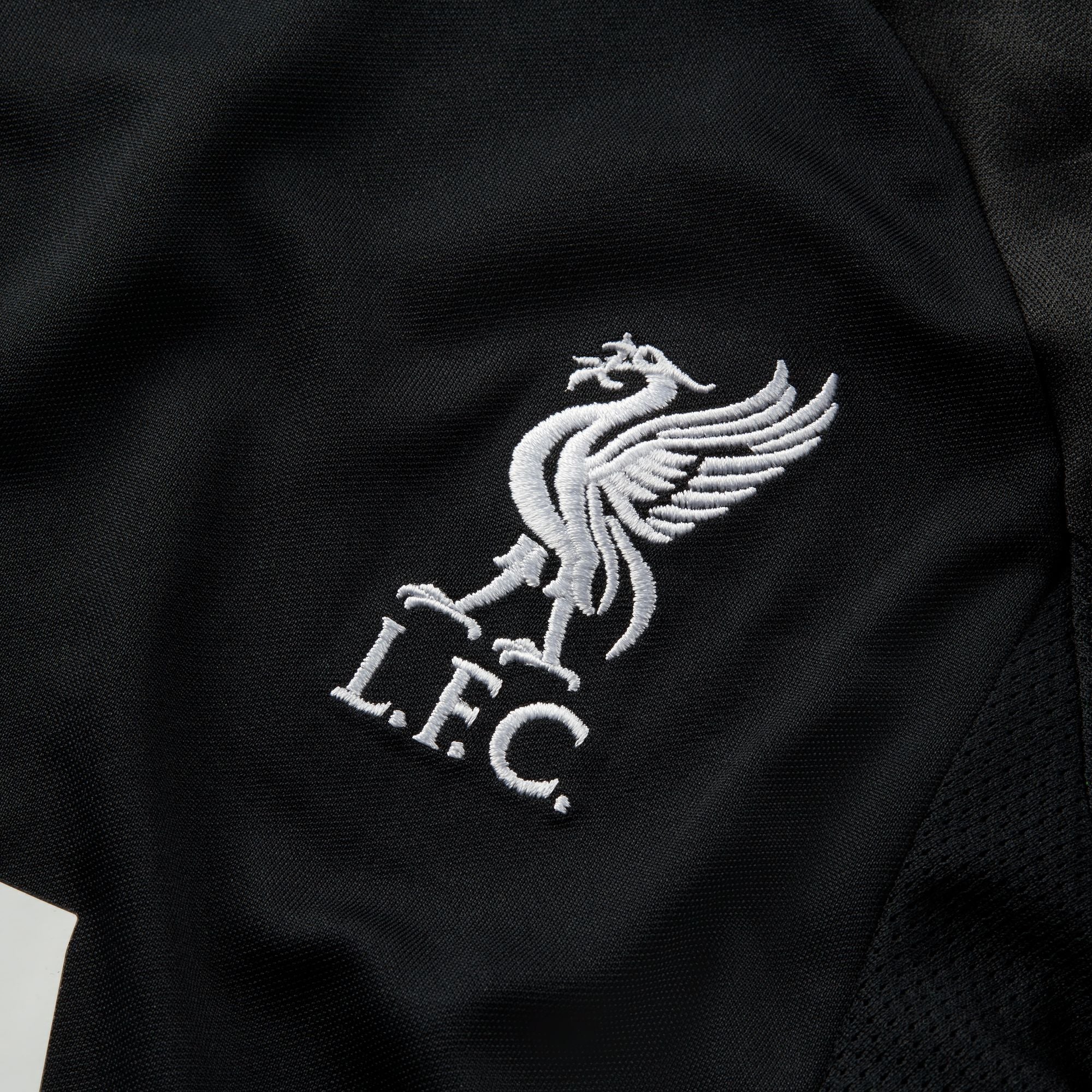 FootkornerLiverpool Junior Trainingstrikot 2023/2024 – Schwarz/Grün/Weiß