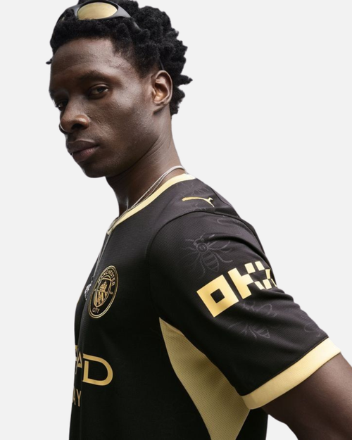 Maillot Extérieur Manchester City 2026/2027 - Noir/Doré - Footkorner