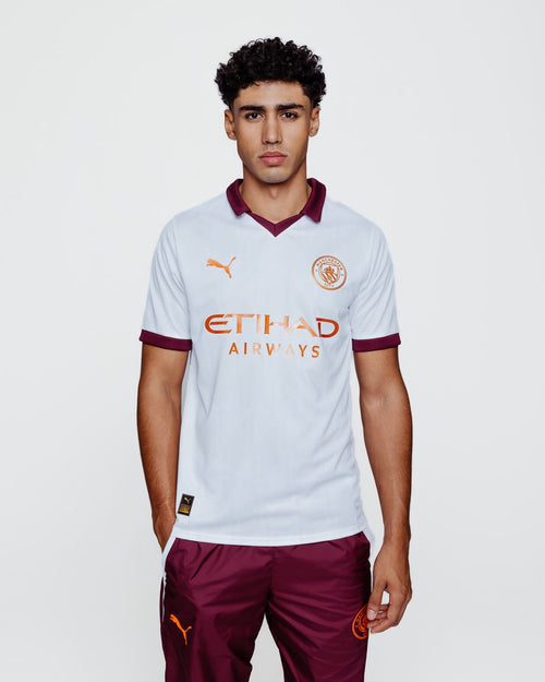 Manchester City Away Jersey 2023/2024 - White/Orange/Bordeaux - Footkorner