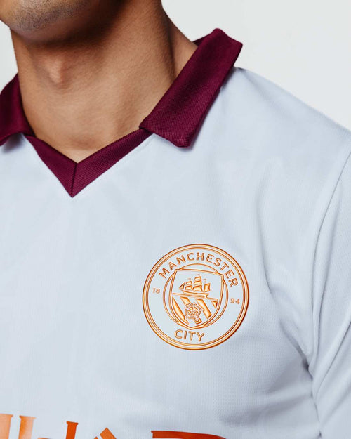 Manchester City Away Jersey 2023/2024 - White/Orange/Bordeaux - Footkorner