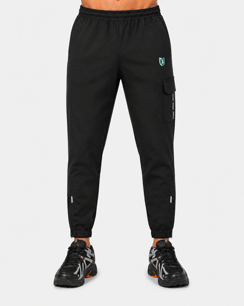FK Wind Trainingsanzug-Set Schwarz + FTKR 1000 Sneaker Schwarz/Orange - Footkorner