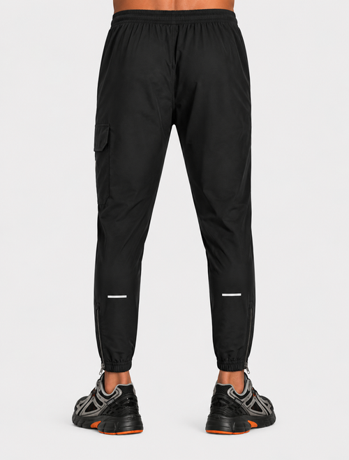 FK Wind Trainingsanzug-Set Schwarz + FTKR 1000 Sneaker Schwarz/Orange - Footkorner