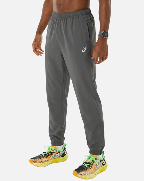 Pantalon Asics Core Woven - Gris - Footkorner