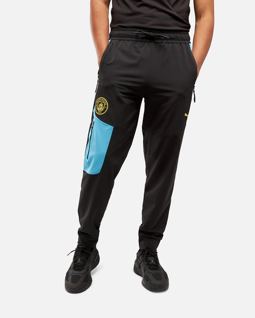 Pantalon de survêtement Manchester City Pumatech - Noir/Bleu - Footkorner