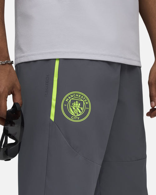 Pantalón de chándal Manchester City 2025/2026 - Gris/Amarillo - Footkorner