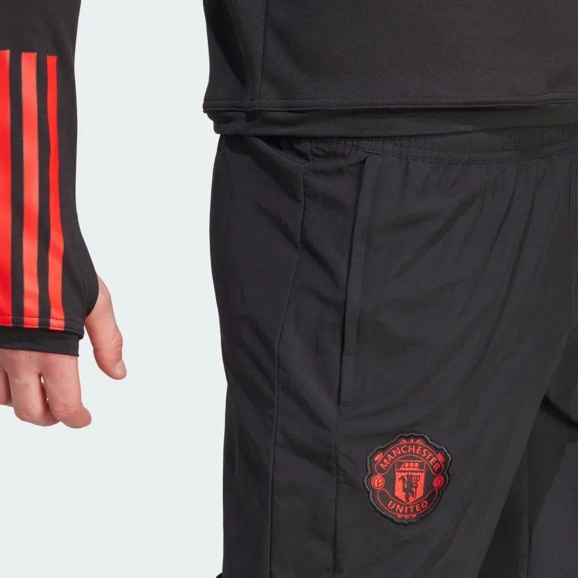 FootkornerPantaloni della tuta del Manchester United - Nero/Rosso