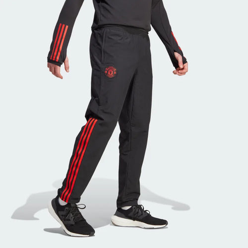 Pantaloni della tuta del Manchester United - Nero/Rosso - Footkorner