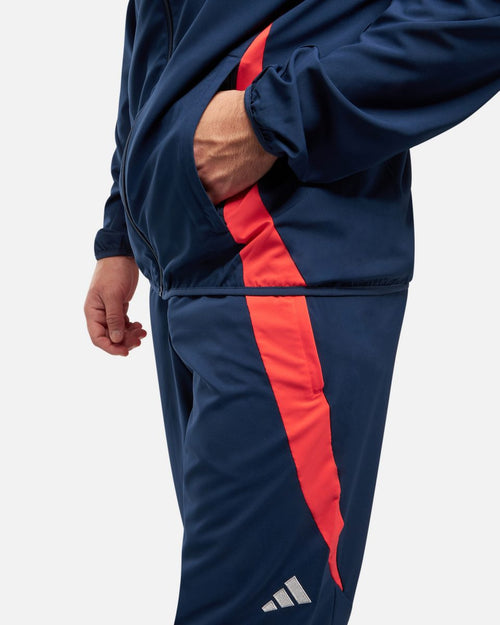 Pantaloni della tuta Manchester United 2024/2025 - Blu/Arancione - Footkorner