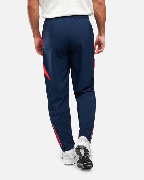 Pantaloni della tuta Manchester United 2024/2025 - Blu/Arancione - Footkorner