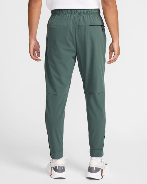 Pantalón deportivo Nike Unlimited - Verde - Footkorner