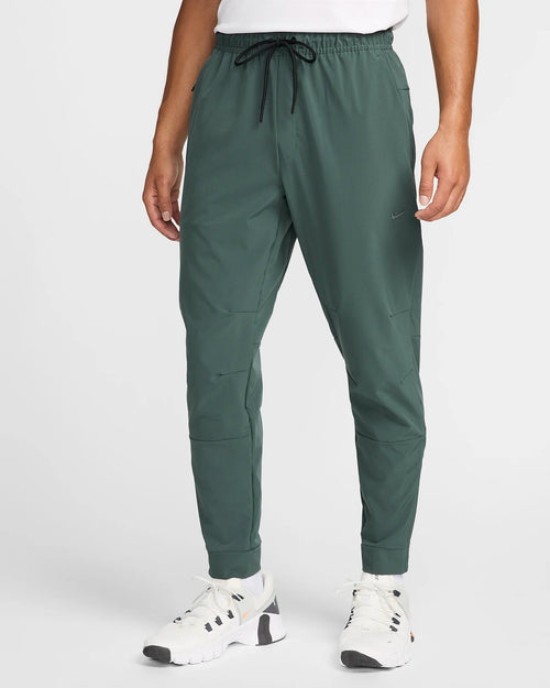 Pantalón deportivo Nike Unlimited - Verde - Footkorner