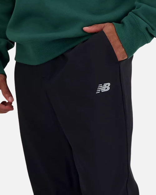Pantalon New Balance AC Tapered - Noir - Footkorner
