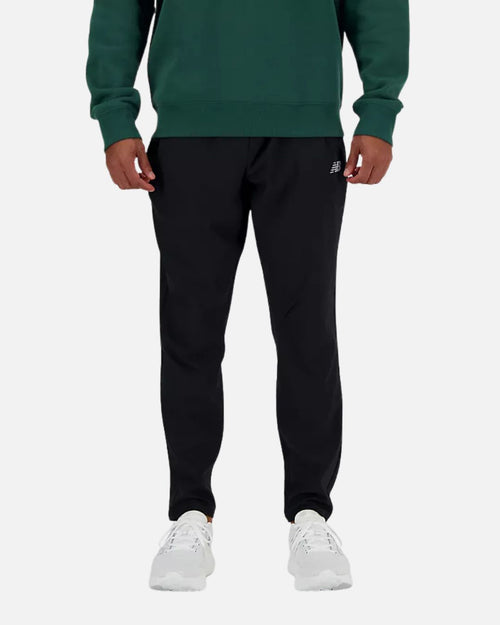 Pantalon New Balance AC Tapered - Noir - Footkorner