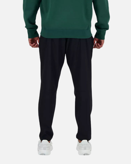 Pantalon New Balance AC Tapered - Noir - Footkorner