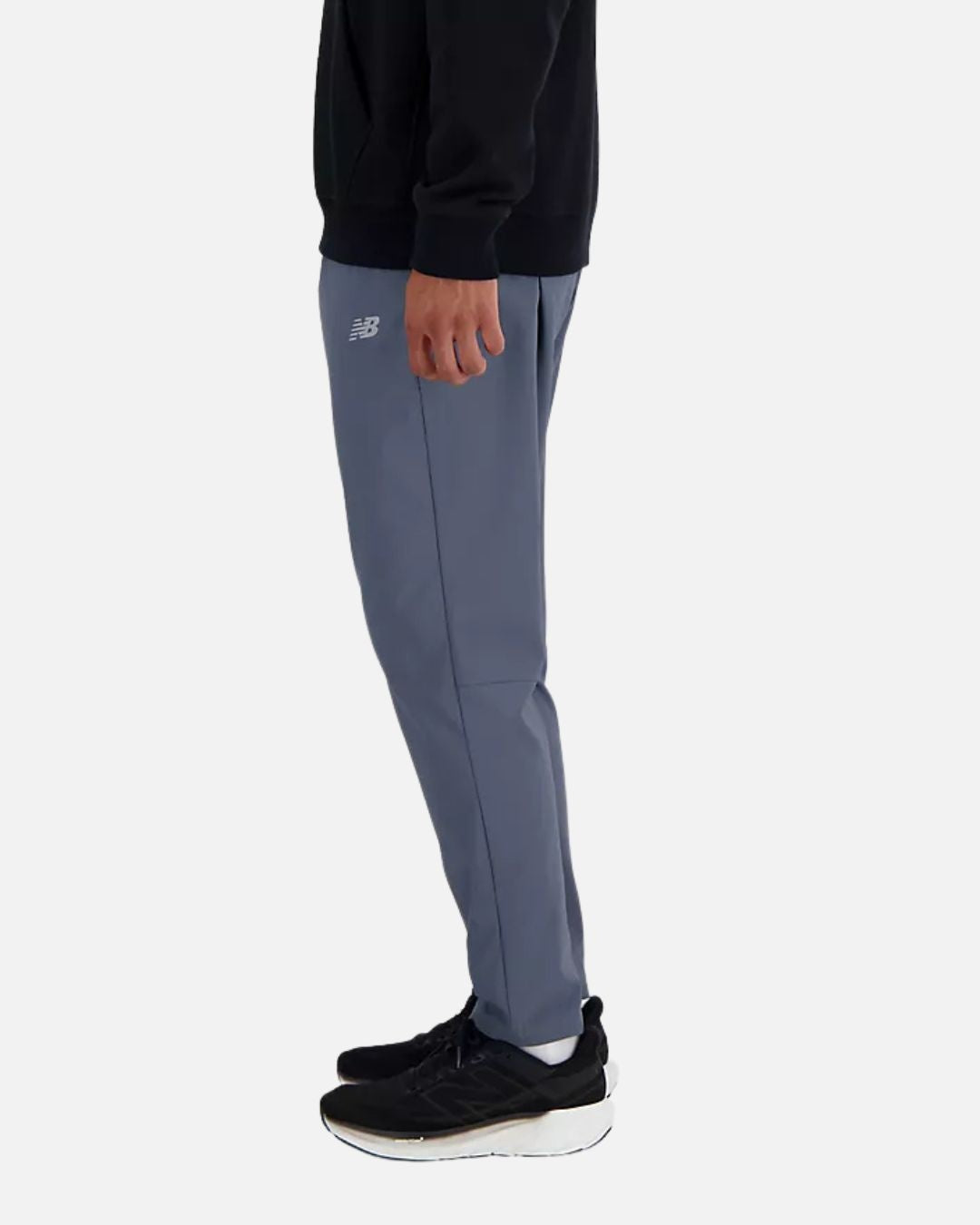 FootkornerPantalon New Balance AC Tapered - Gris
