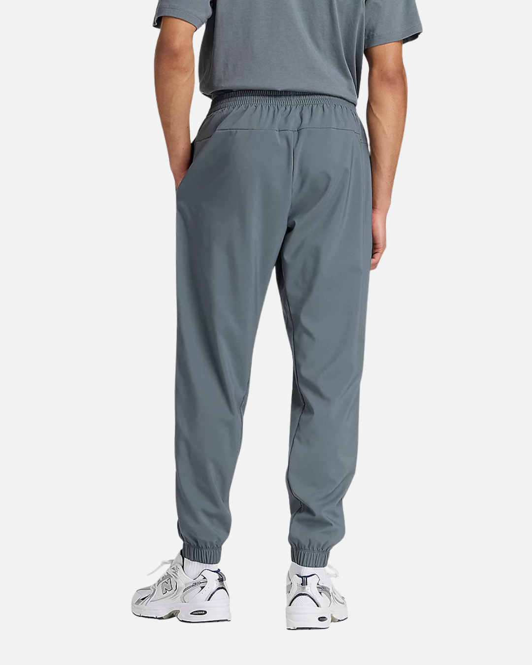 FootkornerPantalón New Balance Reimaginado Tejido - GRIS