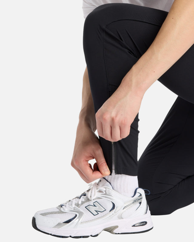 FootkornerPantalon New Balance Sport Woven - Noir