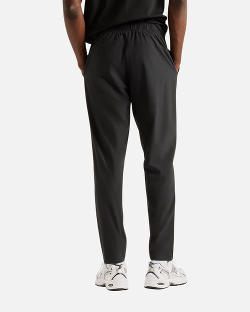 Pantalon New Balance Utility Stretch Woven - Noir - Footkorner