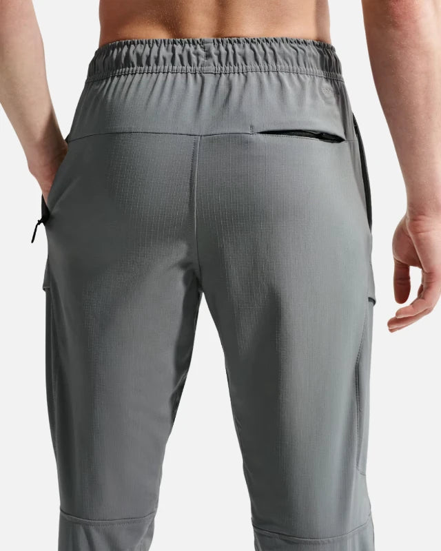 FootkornerPantalón Nike Unlimited Cargo - Gris