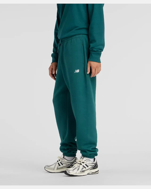 FootkornerPantalon New Balance Sport Essentials - Vert