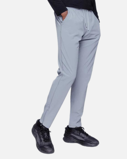 Pantaloni da corsa Under Armour Storm Run - Grigio - Footkorner