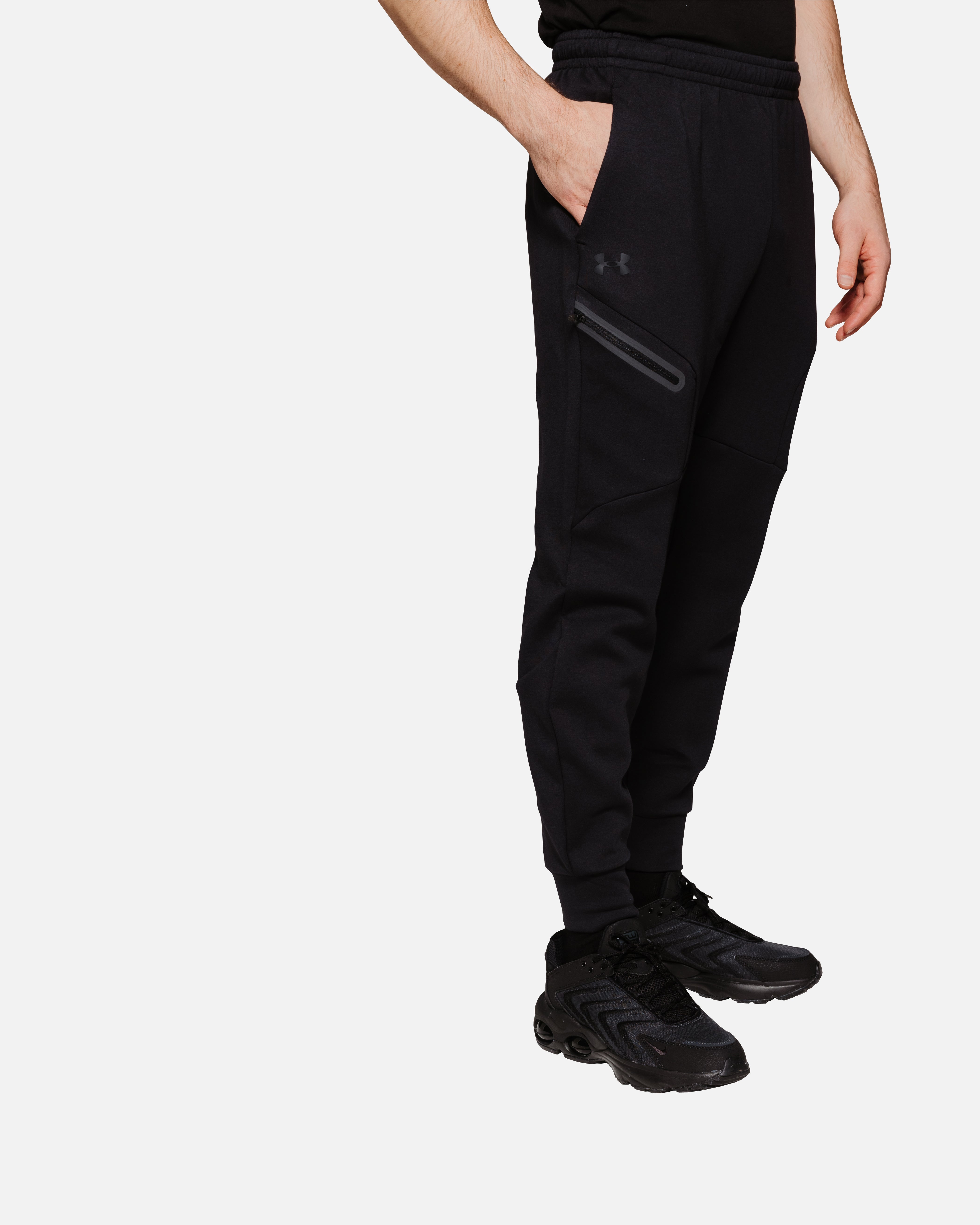 FootkornerPantaloni in pile Under Armour Running Unstoppable - Nero