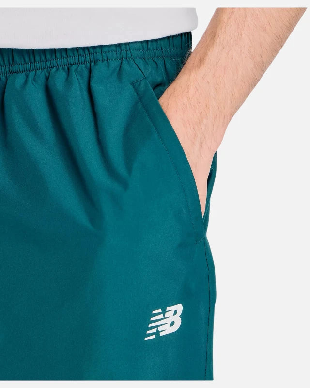 FootkornerPantalon New Balance Utility Woven - Vert