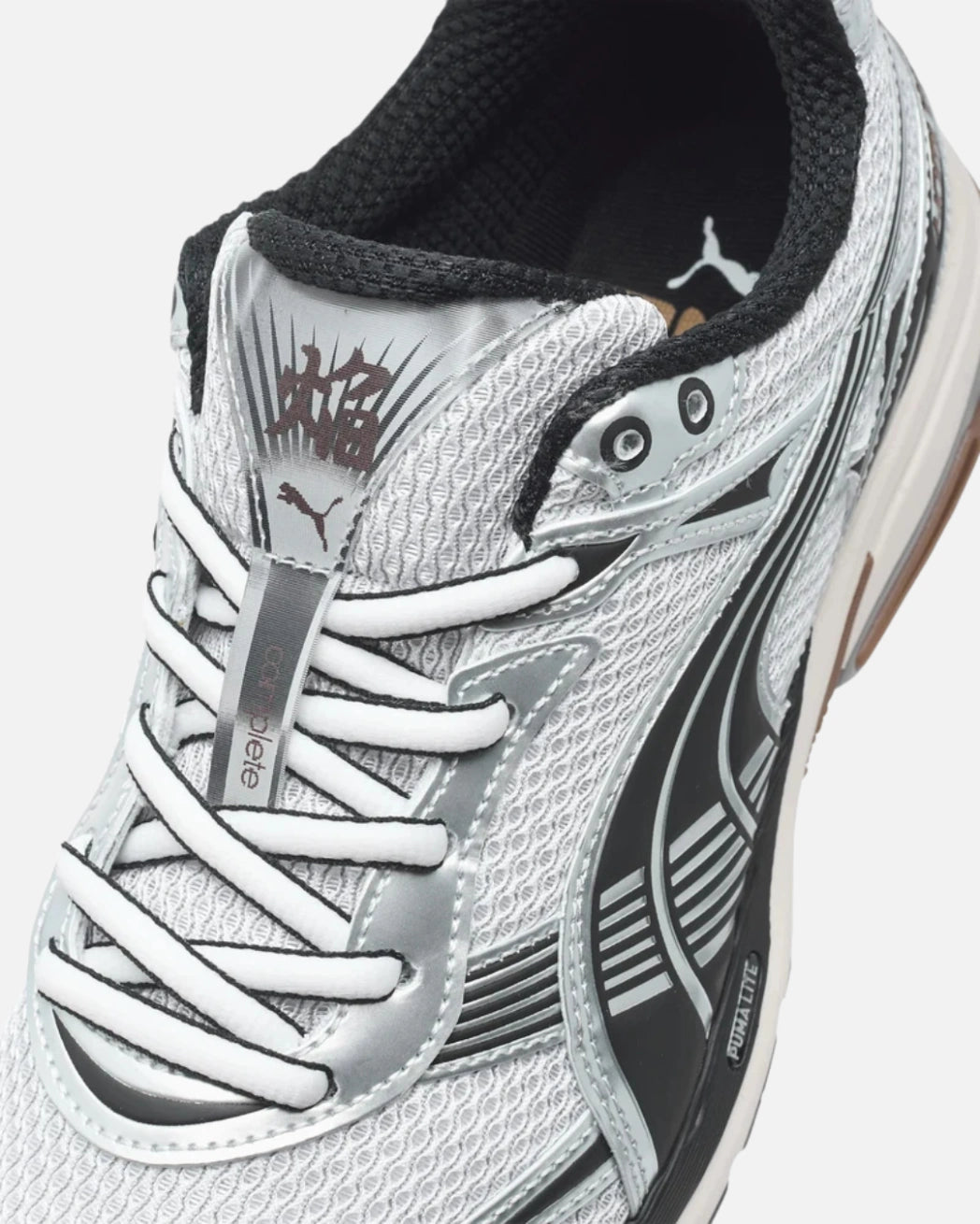 FootkornerPuma Homura OG+ - Plateado/Negro/Marrón