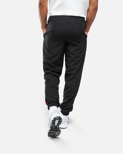 Pantalon de survêtement Milan AC 2024/2025 - Noir/Rouge - Footkorner