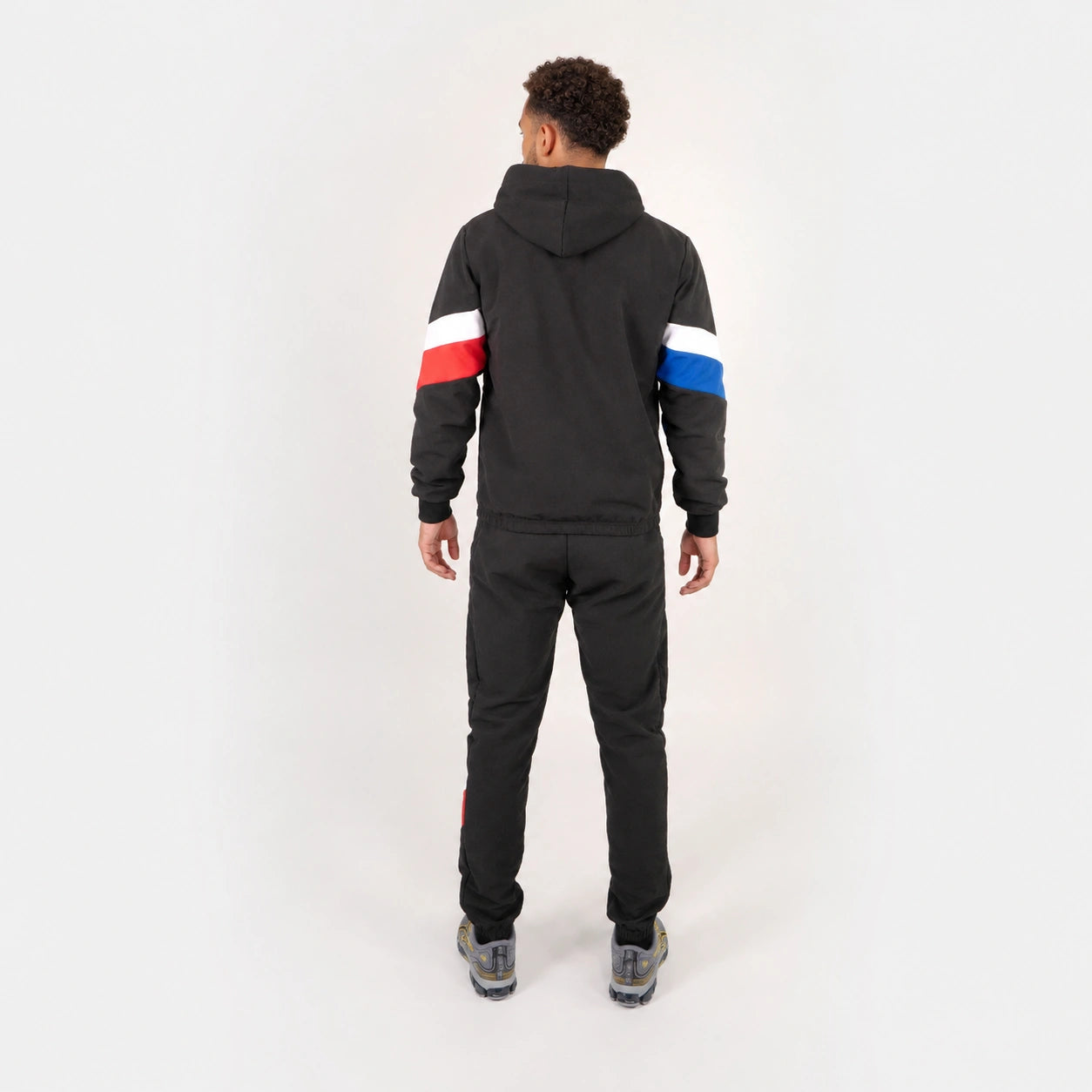 FootkornerFK x Le Coq Sportif Trainingsanzug – Schwarz/Blau/Rot