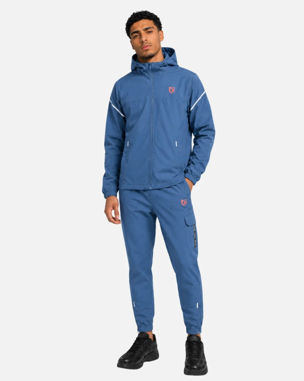FootkornerFK-Wind-Trainingsanzug-Set Blau + FTKR-1000-Sneaker Schwarz