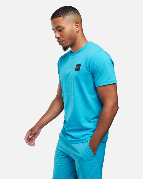 T-Shirt Helvetica Foster - Blau - Footkorner