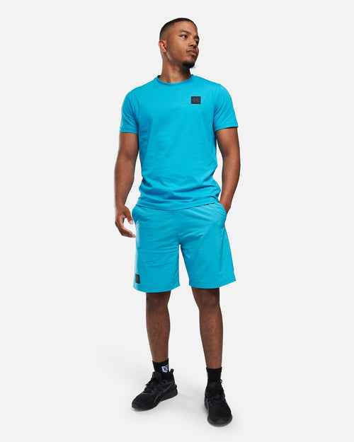 T-Shirt Helvetica Foster - Blau - Footkorner