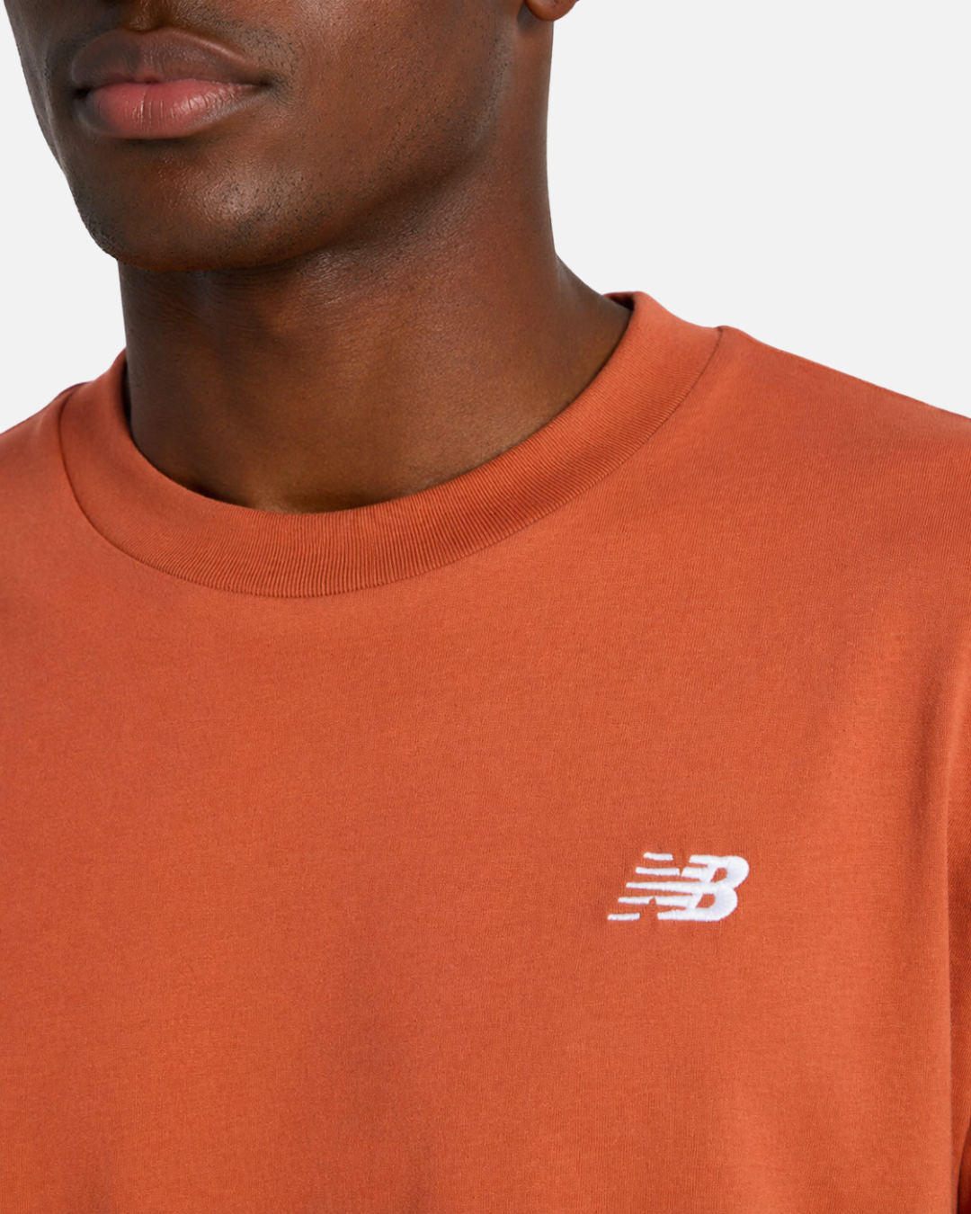 FootkornerT-shirt New Balance Sport Essentials Cotton - Orange