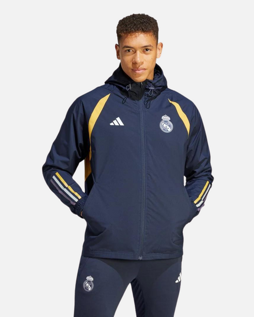Giacca a vento Real Madrid 2023/2024 - Blu/Giallo/Bianco - Footkorner